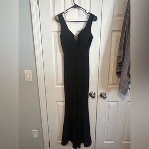 Elegant Black Sleeveless Jumpsuit Boot Legs